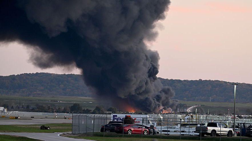 Smoke rising after a plane crash at Louisville International Airport