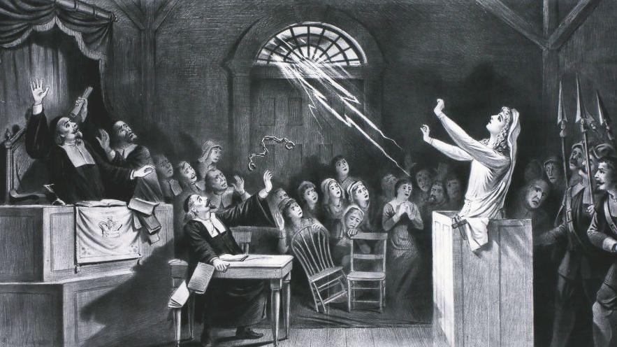 Witch Trial, a young woman accused of witchcraft by Puritan ministers appeals to Satan to save her, circa 1692.