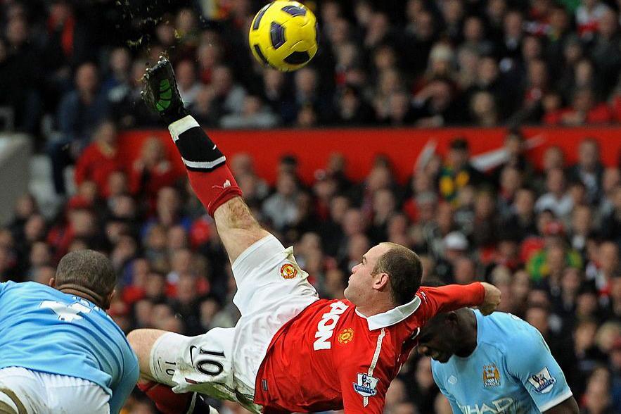 Wayne Rooney scoring an iconic overhead kick against Manchester City for Manchester United in 2011