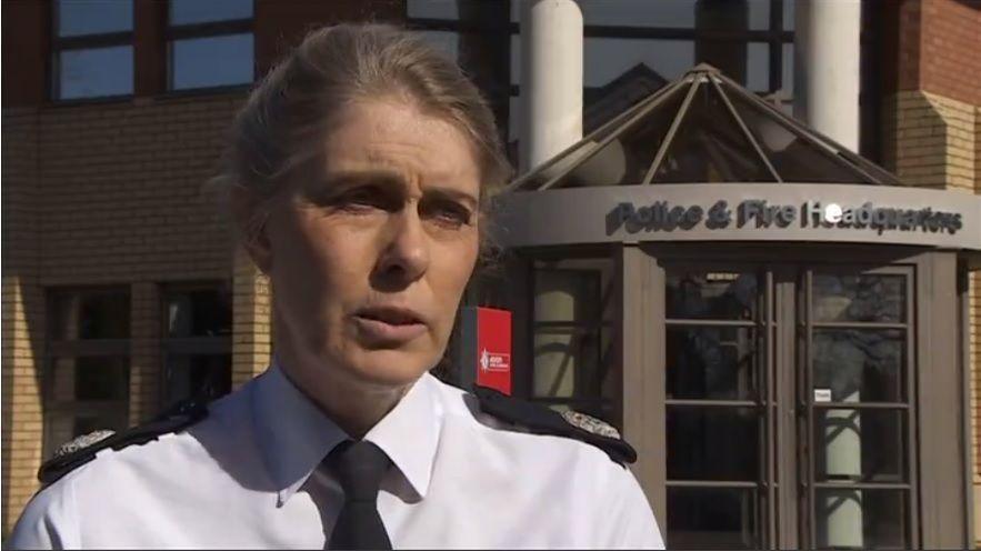 Nikki Watson with fair hair tied back wearing a police uniform