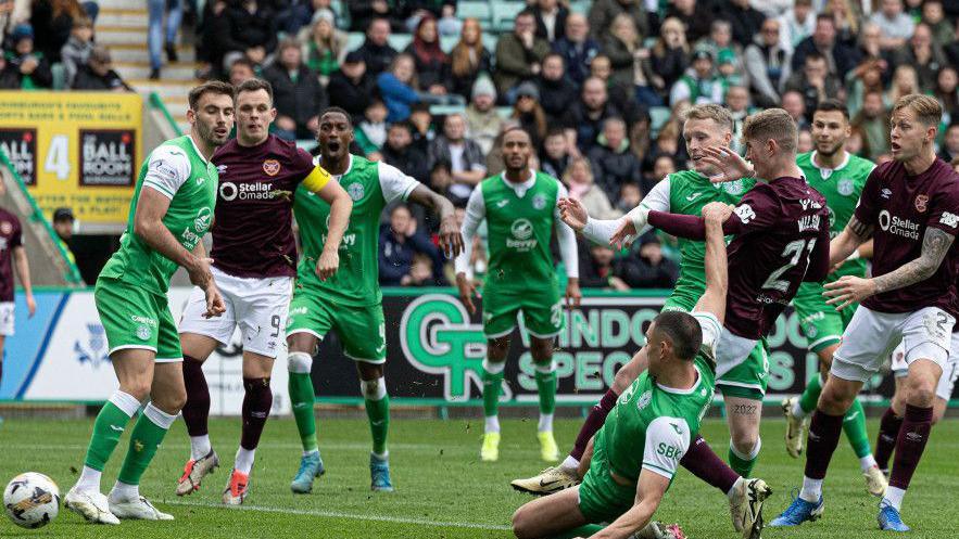 James Wilson reacts first to level the score late on