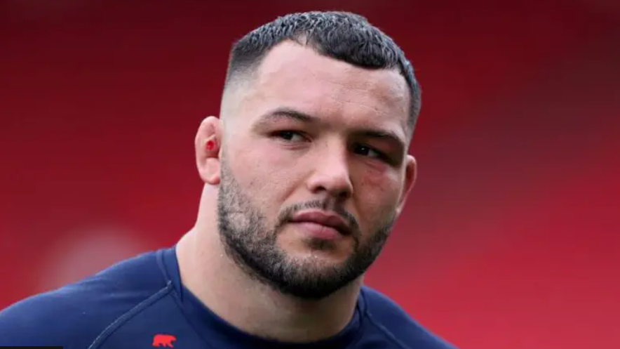 A close-up shot of Ellis Genge looking away to the right of camera