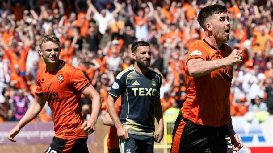 Dundee United's Declan Gallagher (right) celebrates after scoring to make it 1-1 during a William Hill Premiership match between Dundee United and Aberdeen at the CalForth Construction Arena at Tannadice Park