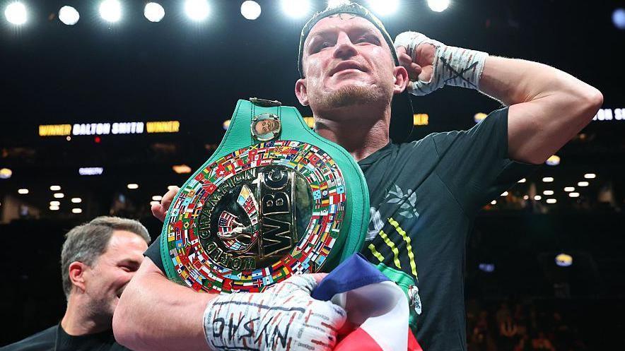 Dalton Smith holds his belt