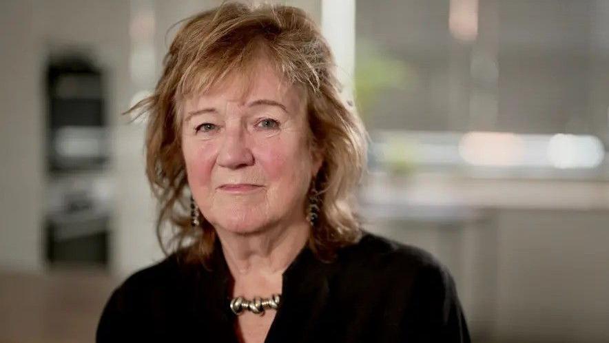 Prof Alexis Jay, a woman with shoulder length fair hair and a black top.