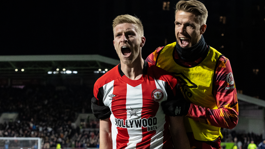Brentford's Ben Mee (left) celebrates scoring with team-mate Kristoffer Ajer 