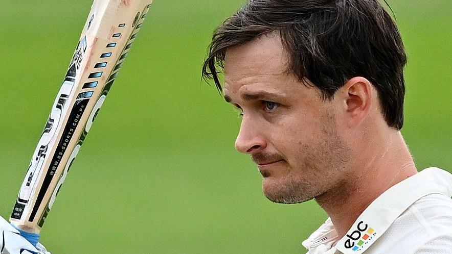 Gareth Roderick raises his bat