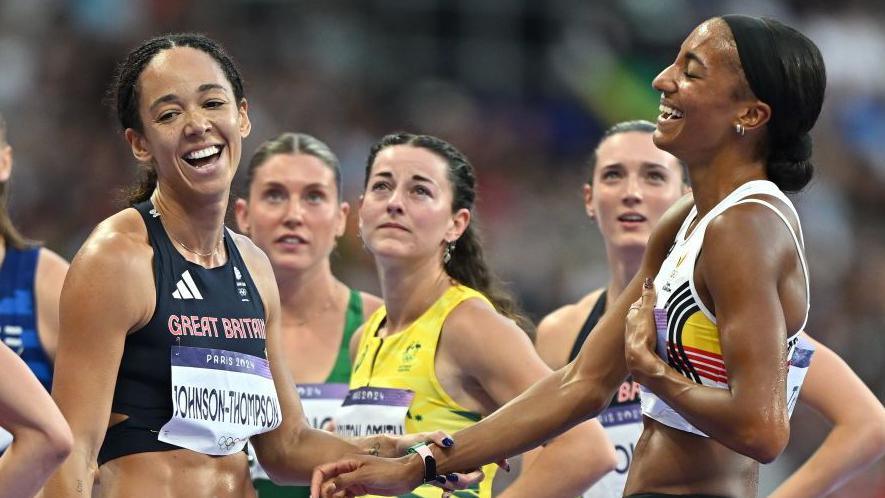 Katarina Johnson-Thompson and Nafi Thiam laughter together aft nan Olympic 800m