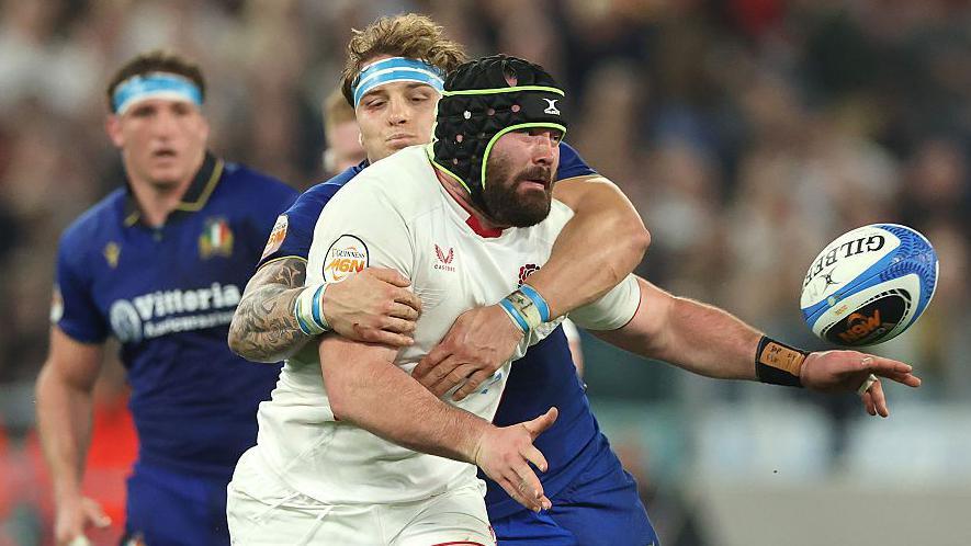 England forward Bevan Rodd attempts an offload during the Six Nations game against Italy on 7 March 2026