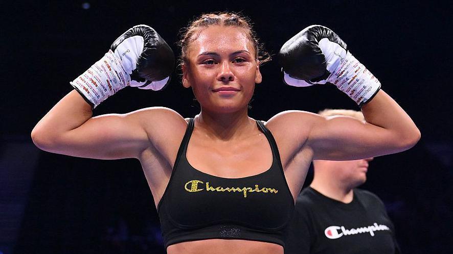 Tiah Mai Ayton celebrates winning her pro debut