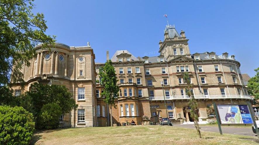 Exterior of Bournemouth town hall. A large Victorian-era stone building incorporating classical and Italianate architectural styles