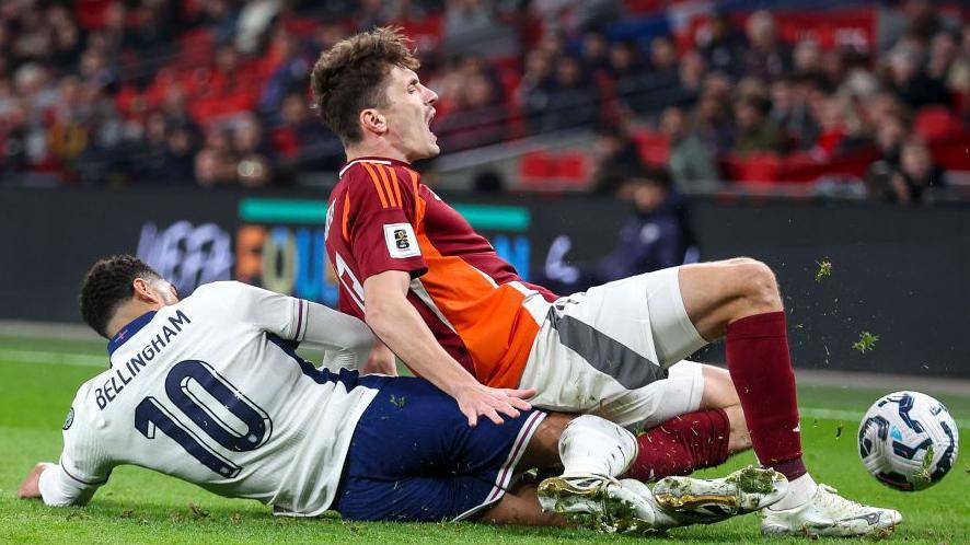England's Jude Bellingham was fortunate not to receive a second yellow card for reckless challenge on Raivis Jurkovskis