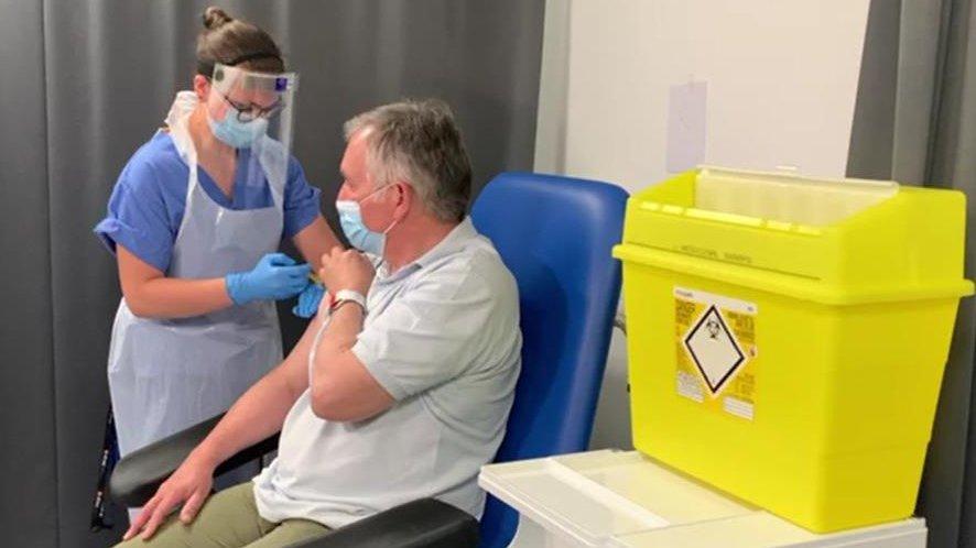 Prof Alex Brown gets a third dose of vaccine