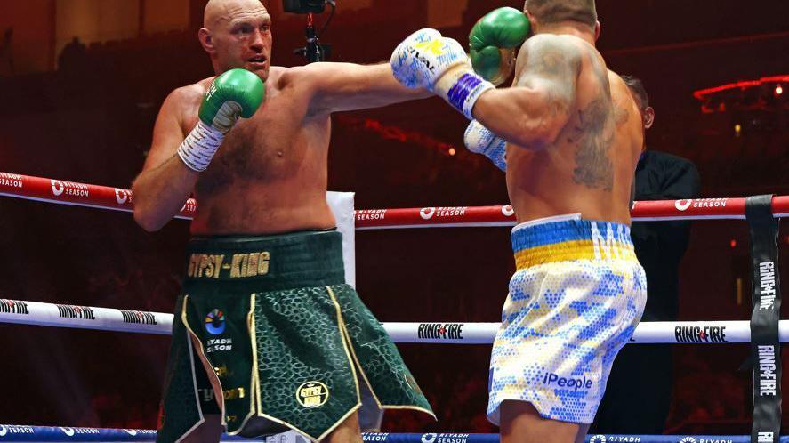 Ukraine's Oleksandr Usyk (R) fights against Britain's Tyson Fury during a heavyweight boxing world championship fight at Kingdom Arena in Riyadh, Saudi Arabia on May 19, 2024. Oleksandr Usyk beat Tyson Fury by split decision to win the world's first undisputed heavyweight championship in 25 years on May 19, 2024, an unprecedented feat in boxing's four-belt era.