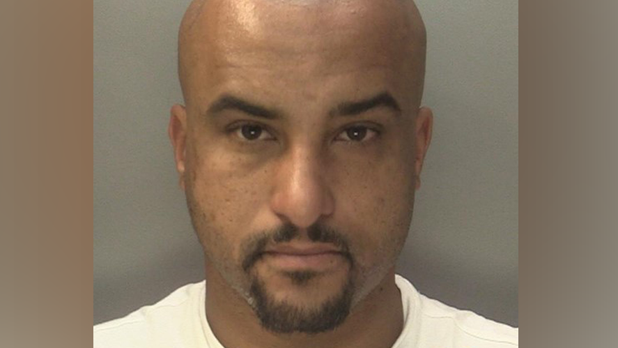 A police custody photo showing James Hurst's face