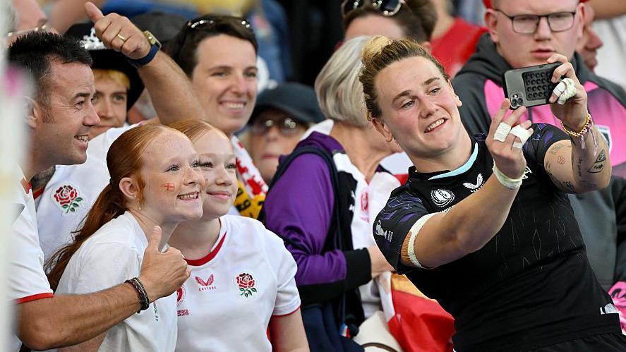 England's Meg Jones poses for a selfie
