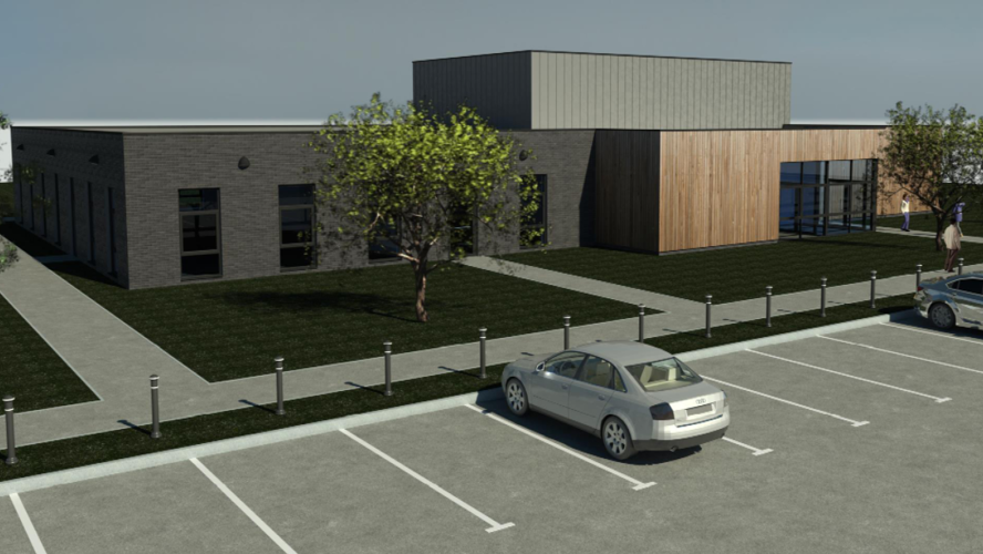 A CGI of the plans for the Southlands Centre. The left side of the single-storey building is made of stone while the right side is wood panelled. There is grass outside and two trees. Cars are parked in the car park.