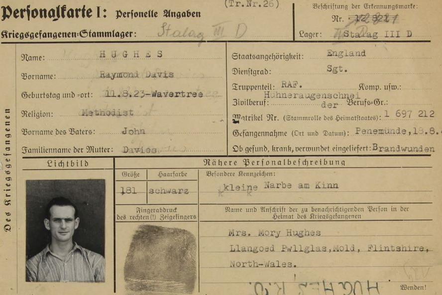 Davies Hughes' photo appears bottom left of a cream-coloured identity card. It also includes details such as his next of kin, date of birth and a fingerprint