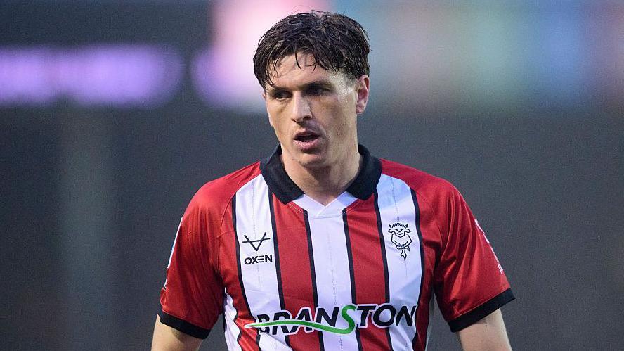 Lincoln City defender Adam Reach