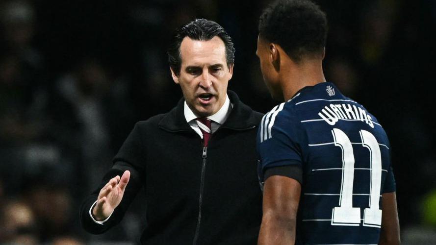 Unai Emery approaches Ollie Watkins during Aston Villa's Champions League triumph complete Young Boys