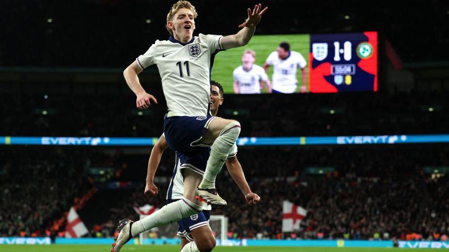 Anthony Gordon jumps for joy after scoring England's second goal against the Republic Of Ireland at Wembley