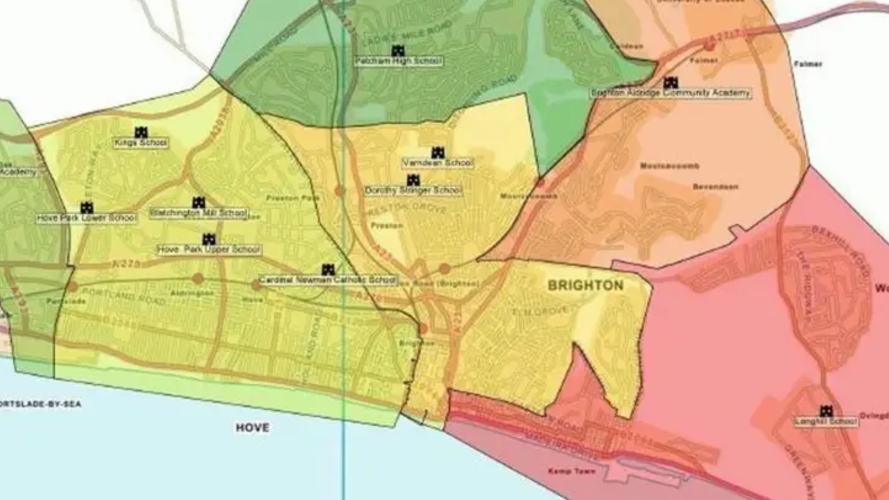 A map showing the proposed new catchment areas for secondary schools in Brighton and Hove; the city region is divided into colour coded sections. East of the city is red, north east is orange, north is green, the central area is yellow and two sections further west are different shades of green.