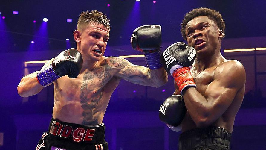 Sam Noakes throws a left hook