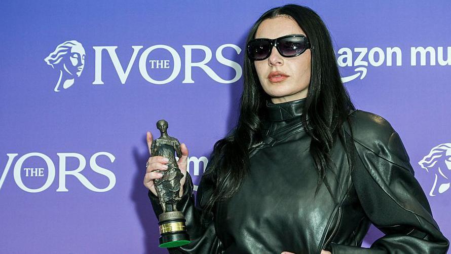 Charli XCX with award