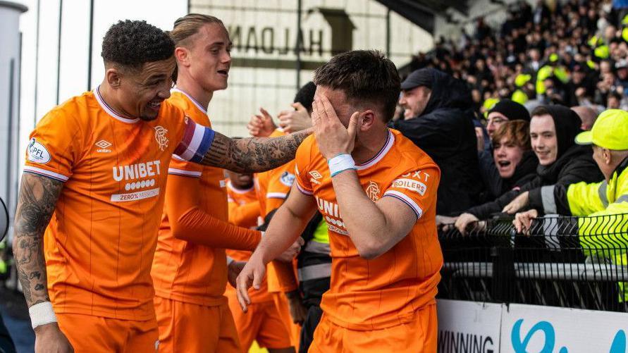 Rangers celebrate scoring at Falkirk
