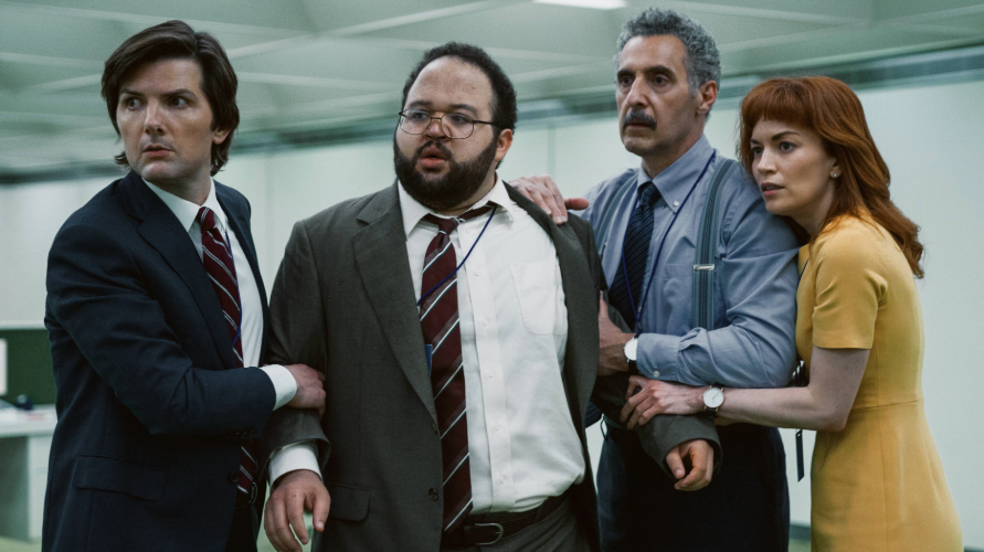 Mark (Adam Scott), Dylan (Zach Cherry) Irving (John Turturro) and Helly (Britt Lower) as the rebellious Macrodata Refinement team inside Lumon's Severed floor