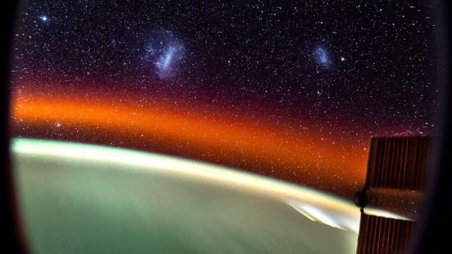 Picture taken from the window of the International Space Stations (ISS) which shows a large number of stars as well as the large Magellanic Cloud and Small Magellanic Cloud.