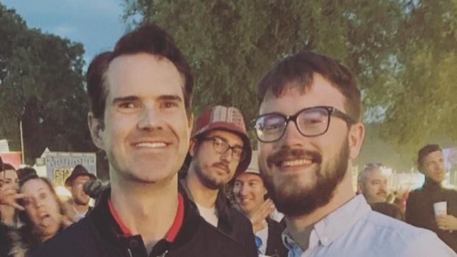 Adam met Jimmy Carr smiling at festival