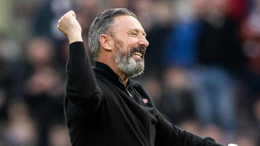 Hearts manager Derek McInnes celebrates at full time during a William Hill Premiership match between Heart of Midlothian and Dundee at Tynecastle Park
