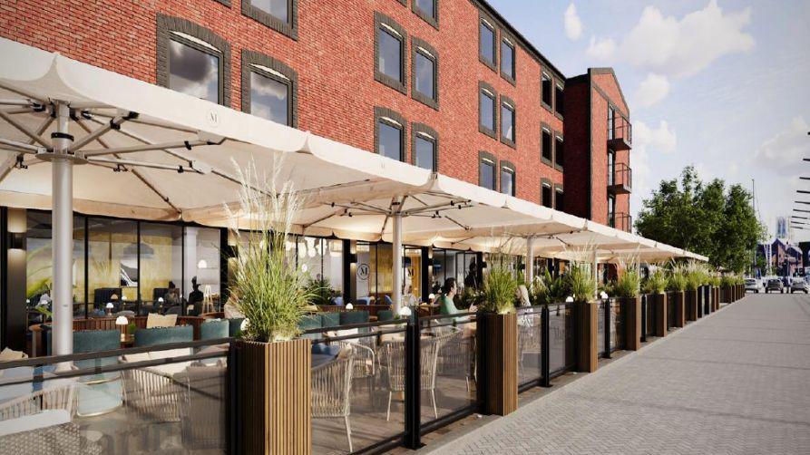 A CGI image of a covered courtyard/terrace in front of a red brick building. On the right is a promenade