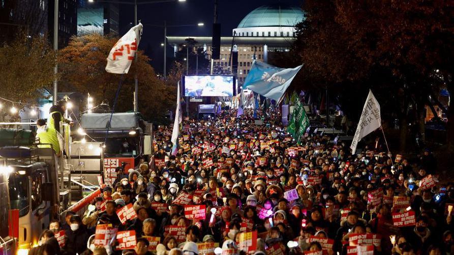 Protesters attend a rally calling for the impeachment of South Korean President Yoon Suk Yeol in front of the National Assembly in Seoul, South Korea, December 9, 2024