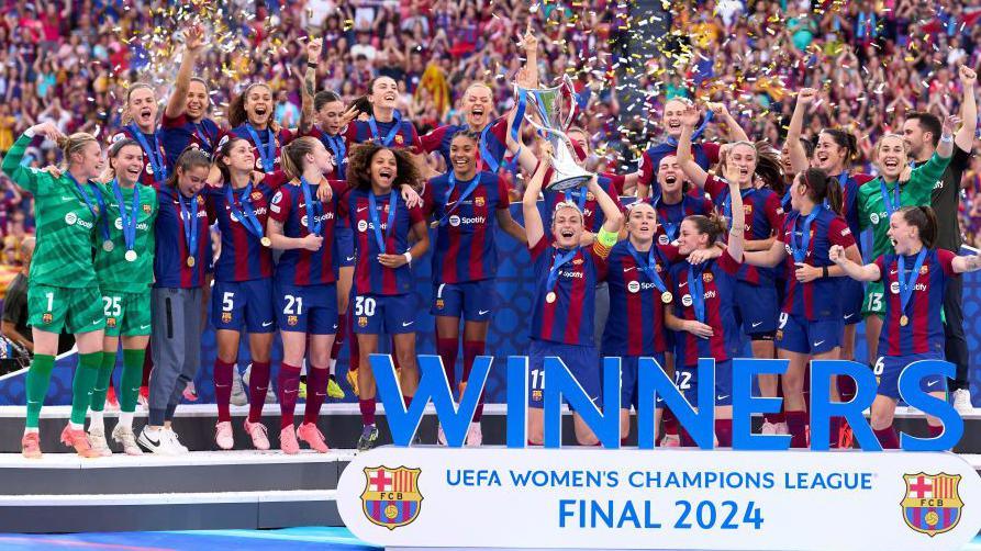 Barcelona celebrate with the 2023-24 Women's Champions League trophy