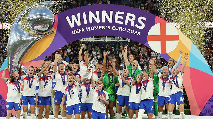 England lifting the Euros trophy in 2025.