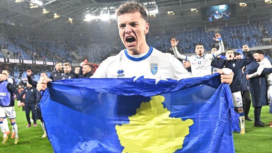 Fisnik Asllani celebrates after the 2026 World Cup European qualification semi-final play-off between Slovakia and Kosovo in Bratislava