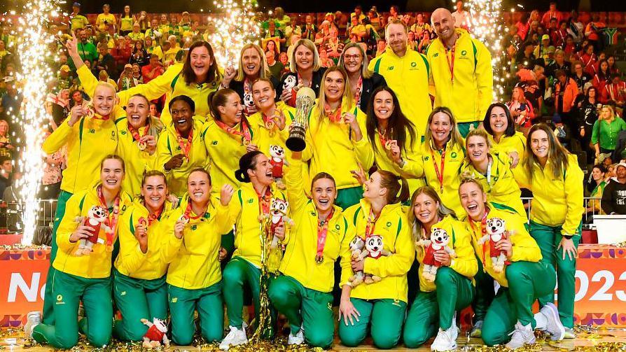 Australia players celebrate with the Netball World Cup