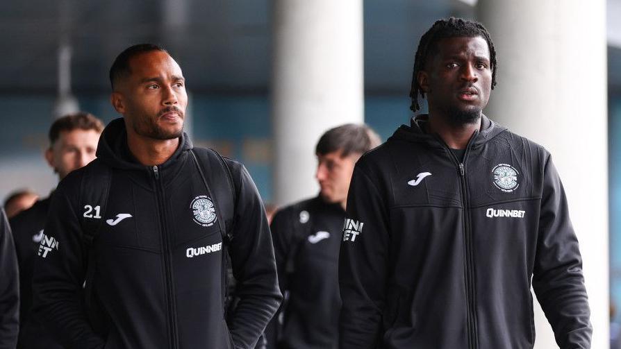 Hibs defenders Jordan Obita and Rocky Bushiri setting off from Edinburgh Airport