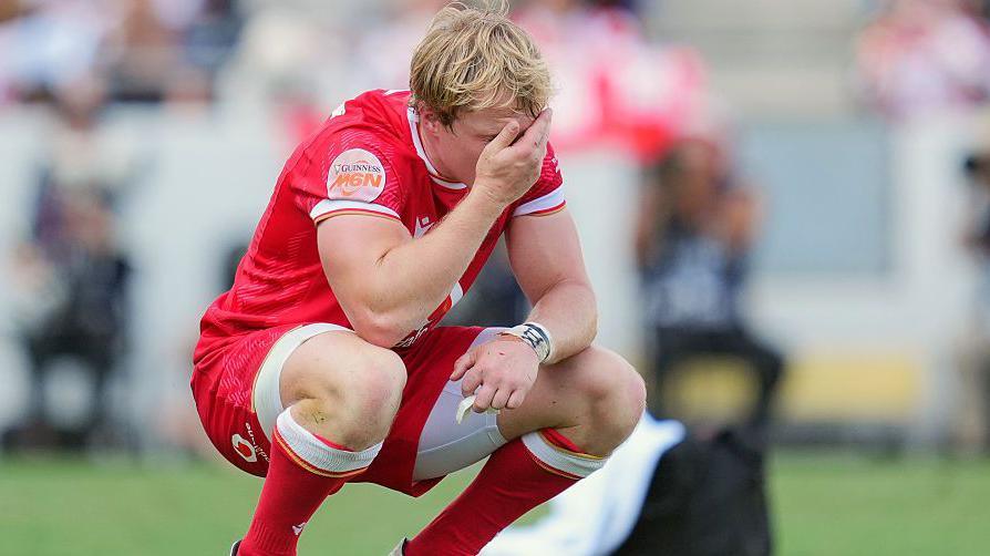 Wales full-back Blair Murray shows his despair after defeat against Japan