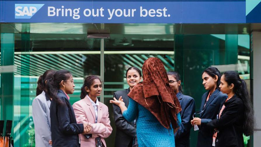 Women employees at the SAP SE Labs facility in Bengaluru, India pictured chatting with one another. 