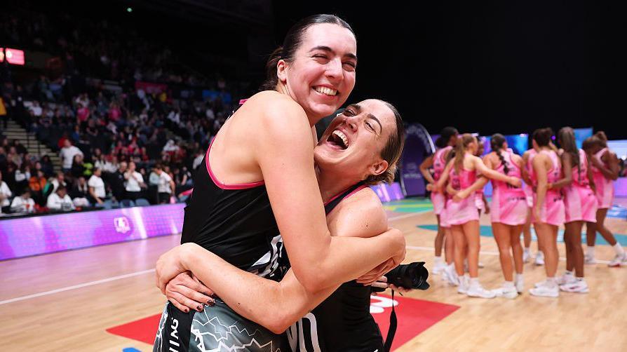 Nat Panagarry of Loughborough Lightning celebrates with team-mate Alice Harvey