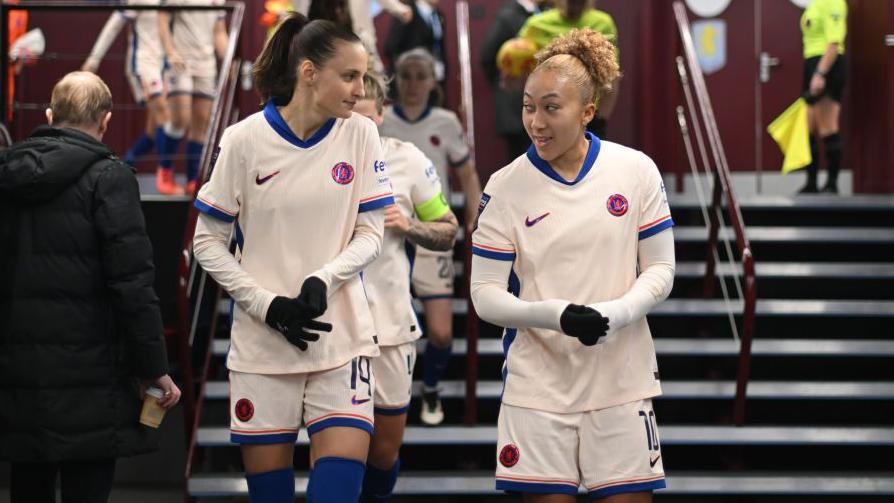 Chelsea's Nathalie Bjorn and Lauren James talk in the tunnel ahead of a Women's Super League fixture.