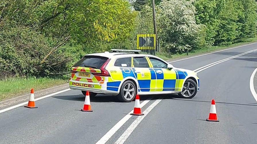 A police car blocks the road in Writtle