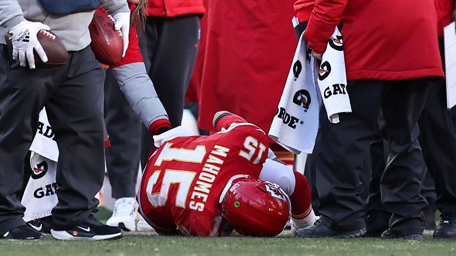 Patrick Mahomes lies on the field injured during the Kansas City Chiefs' defeat to the Los Angeles Chargers