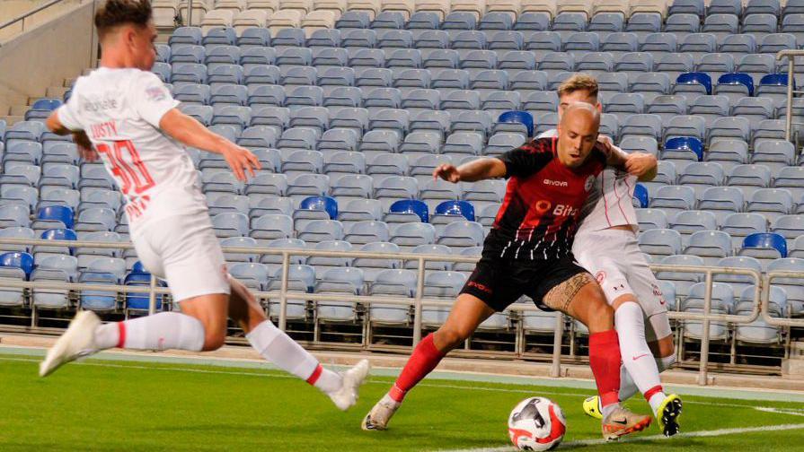 Action from the Uefa Conference League play-off first leg between Lincoln Red Imps and Larne in Portugal