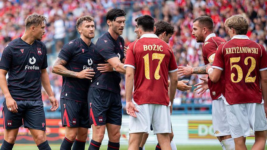 Callum Doyle, Dan Scarr, and Kieffer Moore of Wrexham during Saturday's pre-season game against Wisla Krakow 