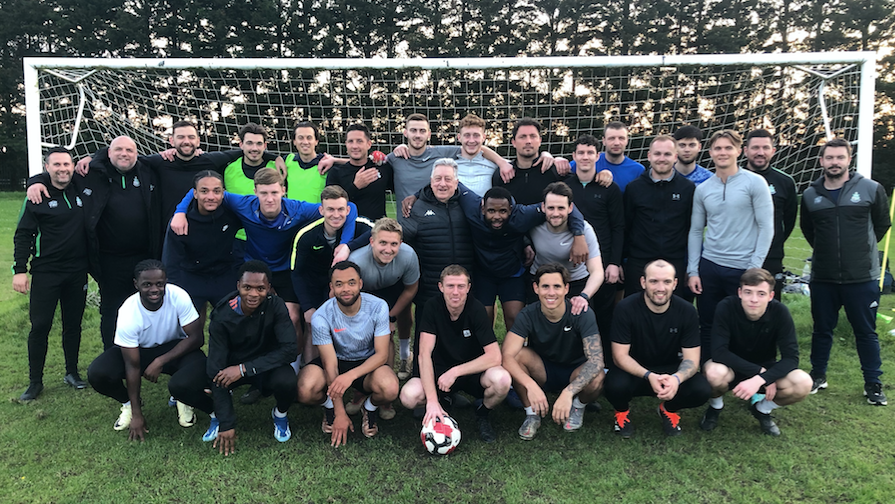 Great Wakering Rovers players and staff gather in training