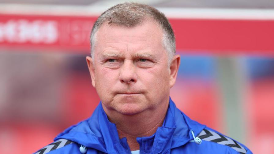 Mark Robins looks on as Coventry boss from the sidelines at the Bet365 Stadium